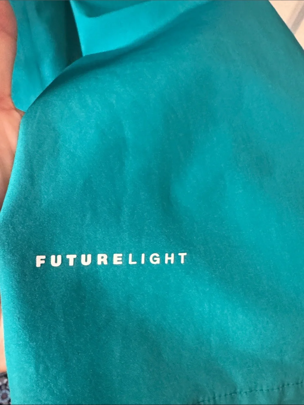 The North Face Men's Two-Tone Hooded Anorak Rain Jacket in Teal and Black